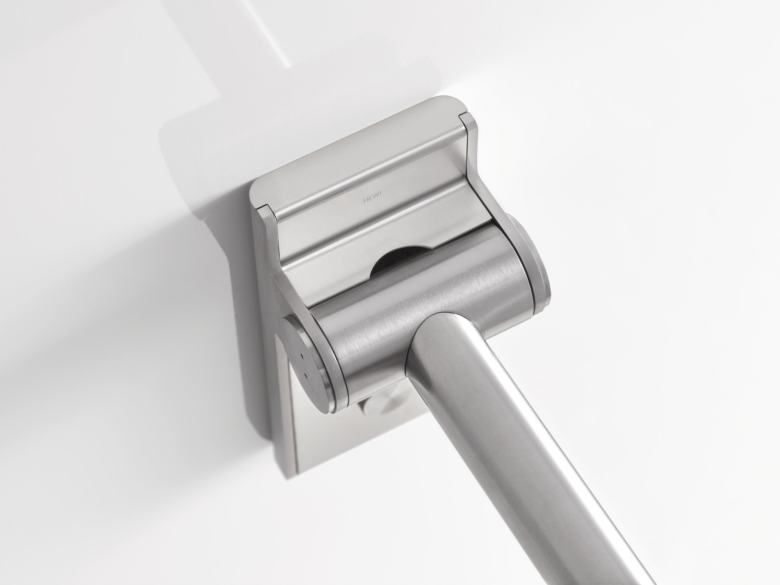 HEWI folding support rail in System 900 Hinged support handle