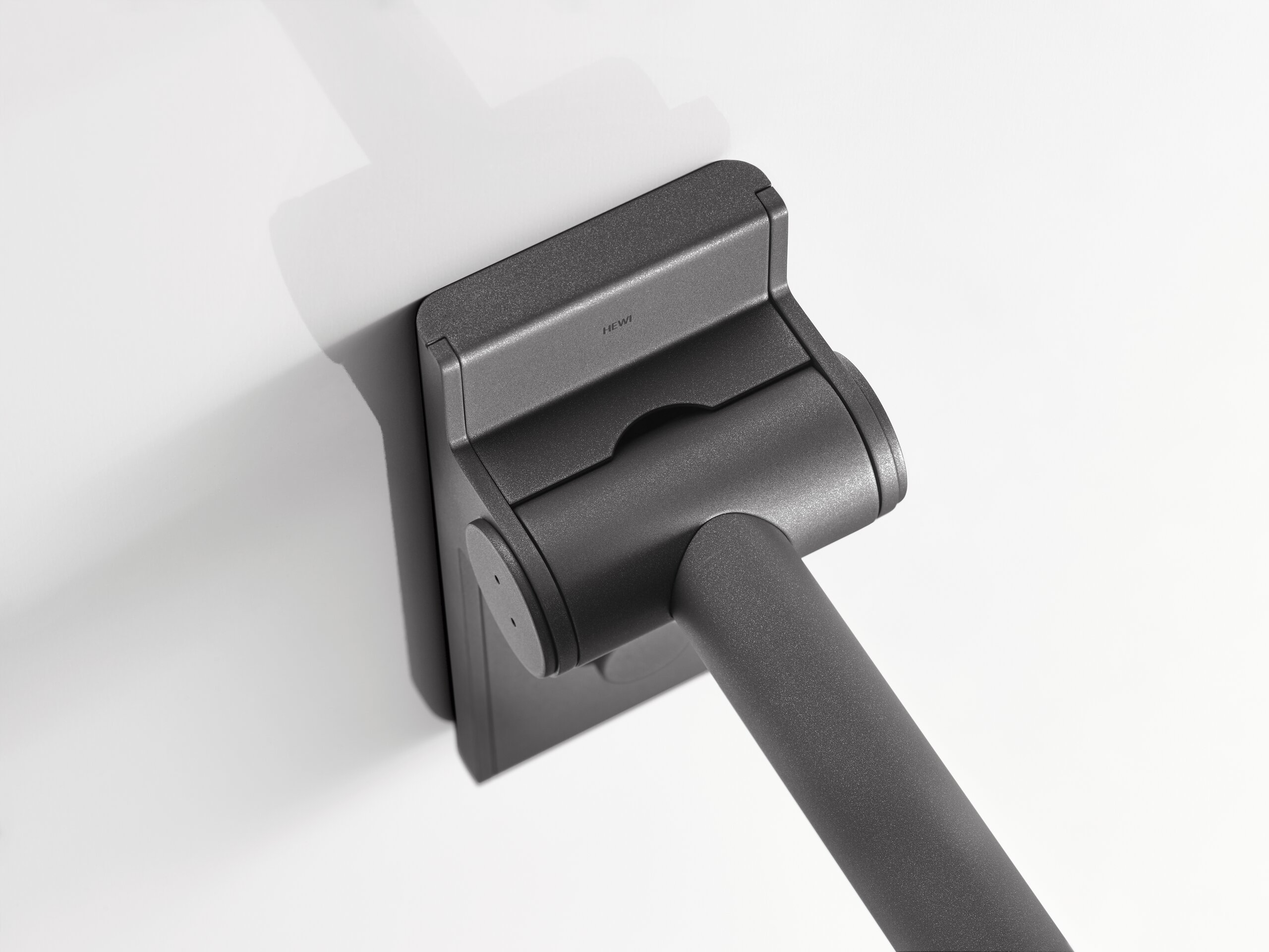 HEWI folding support rail in System 900 Hinged support handle